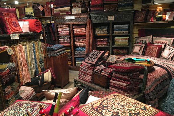 Shopping for hand-dyed fabrics at Maiwa Handprints, Net Loft on Granville Island, Vancouver, Canada